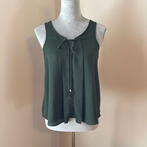 Green sleeveless blouse